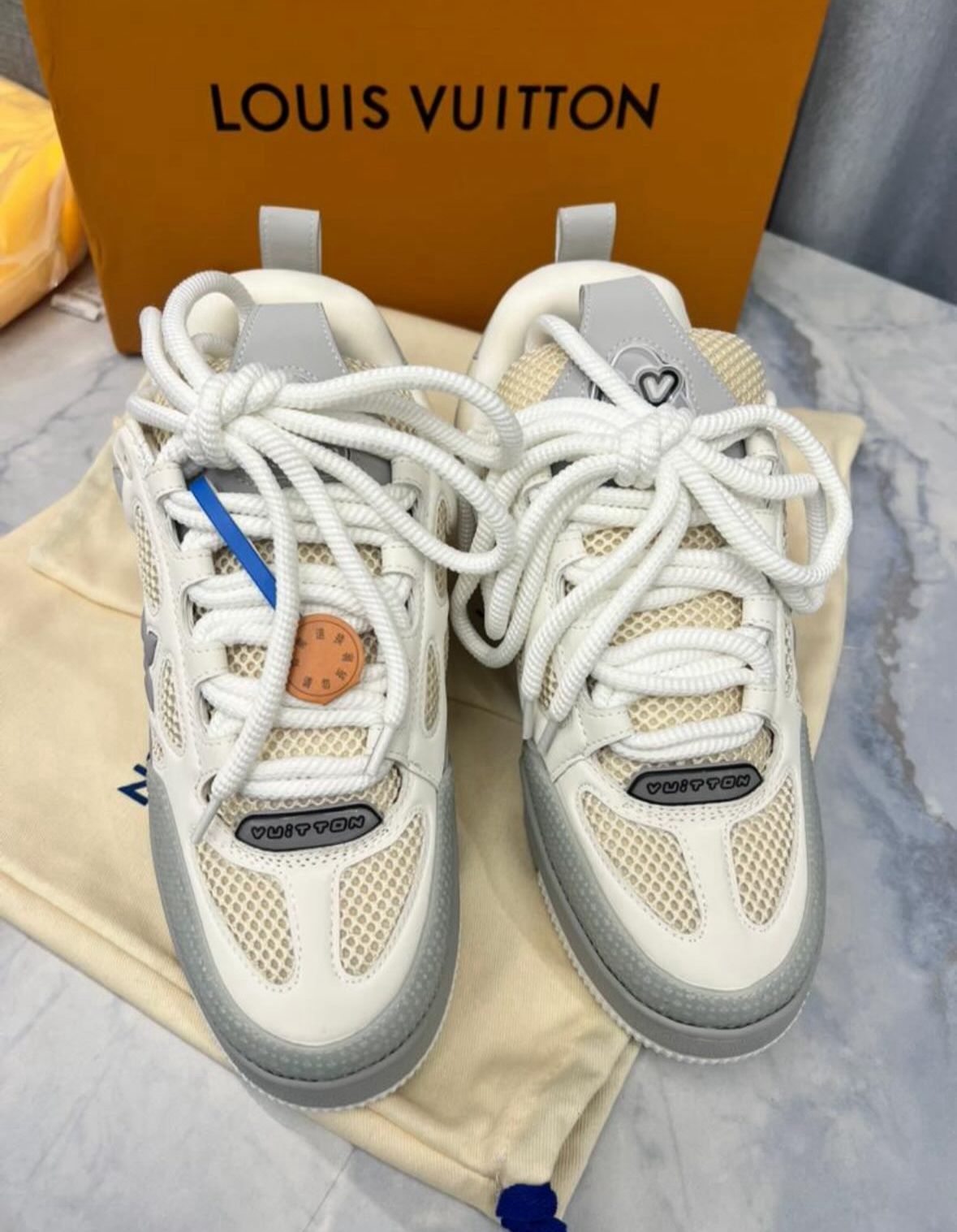 LV skates white grey