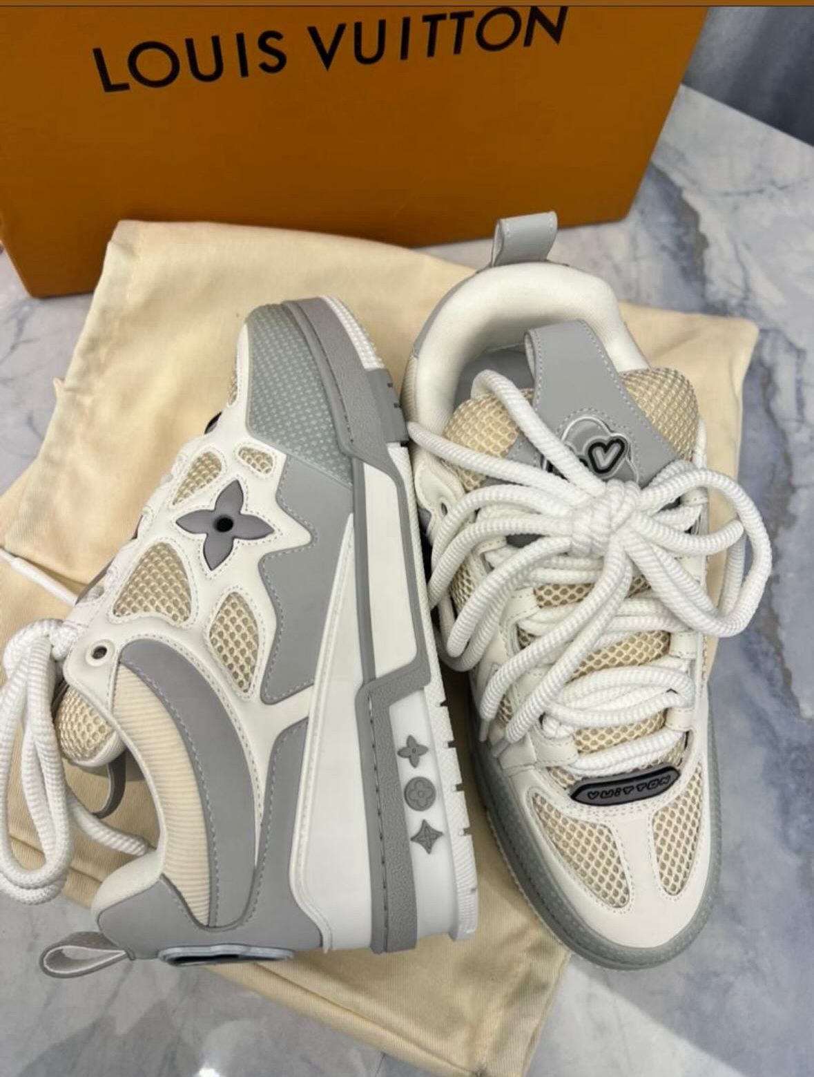 LV skates white grey